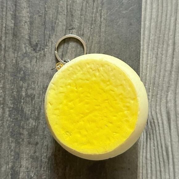 yellow silly face squishy keychain - Picture 3 of 3